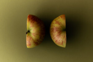 image of sliced apple facing opposite sides
